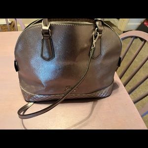 Silver Guess purse in good condition barely used.